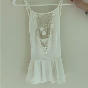 White lace peplum top, with crossback